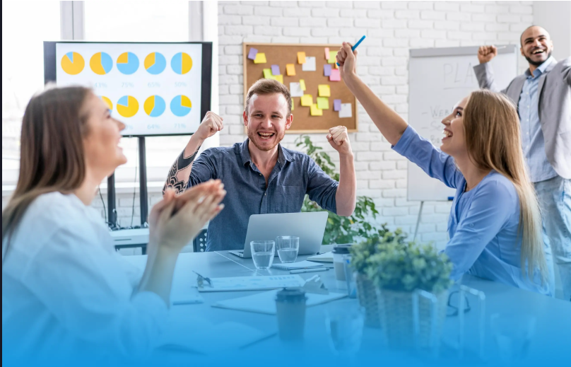 Office cheering celebrating success